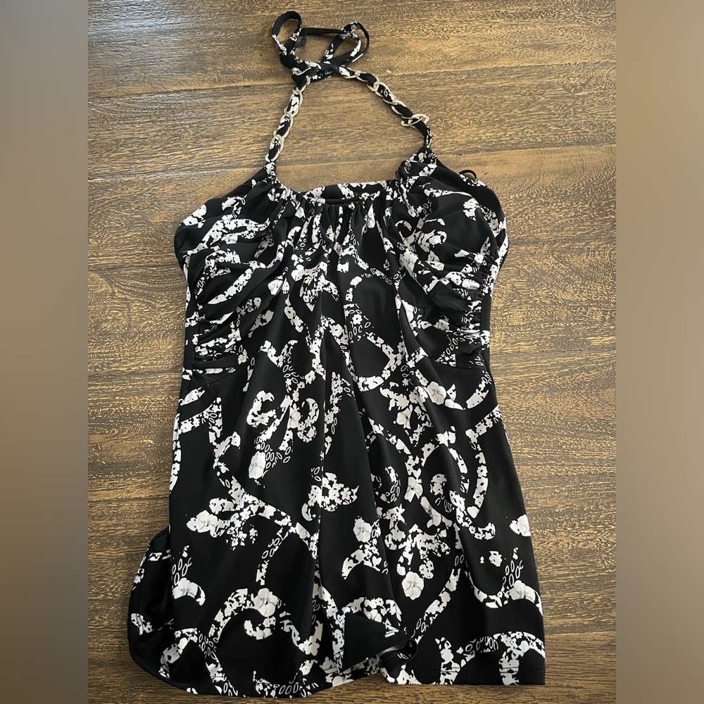 White House Black Market halter top never worn with tags. Small.